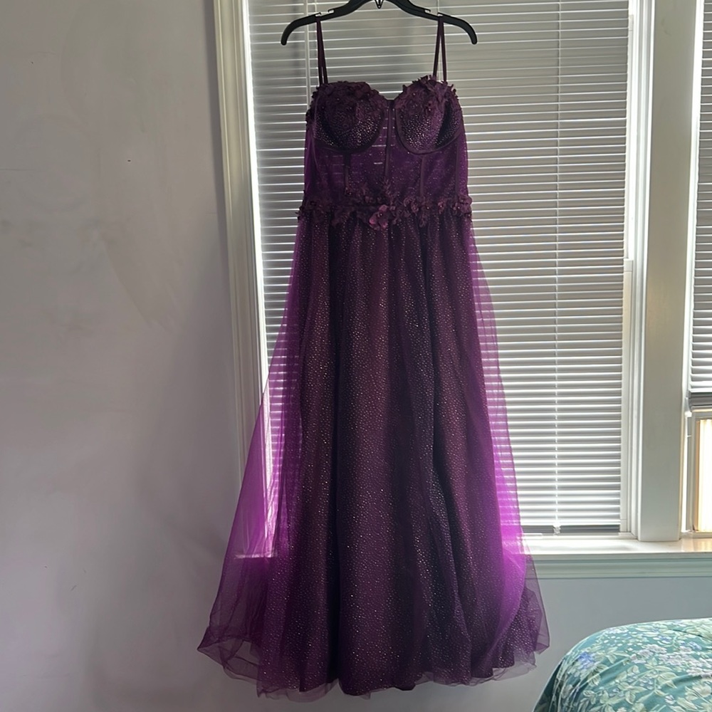 Plum purple see through corset prom dress with leg slit. Size 12